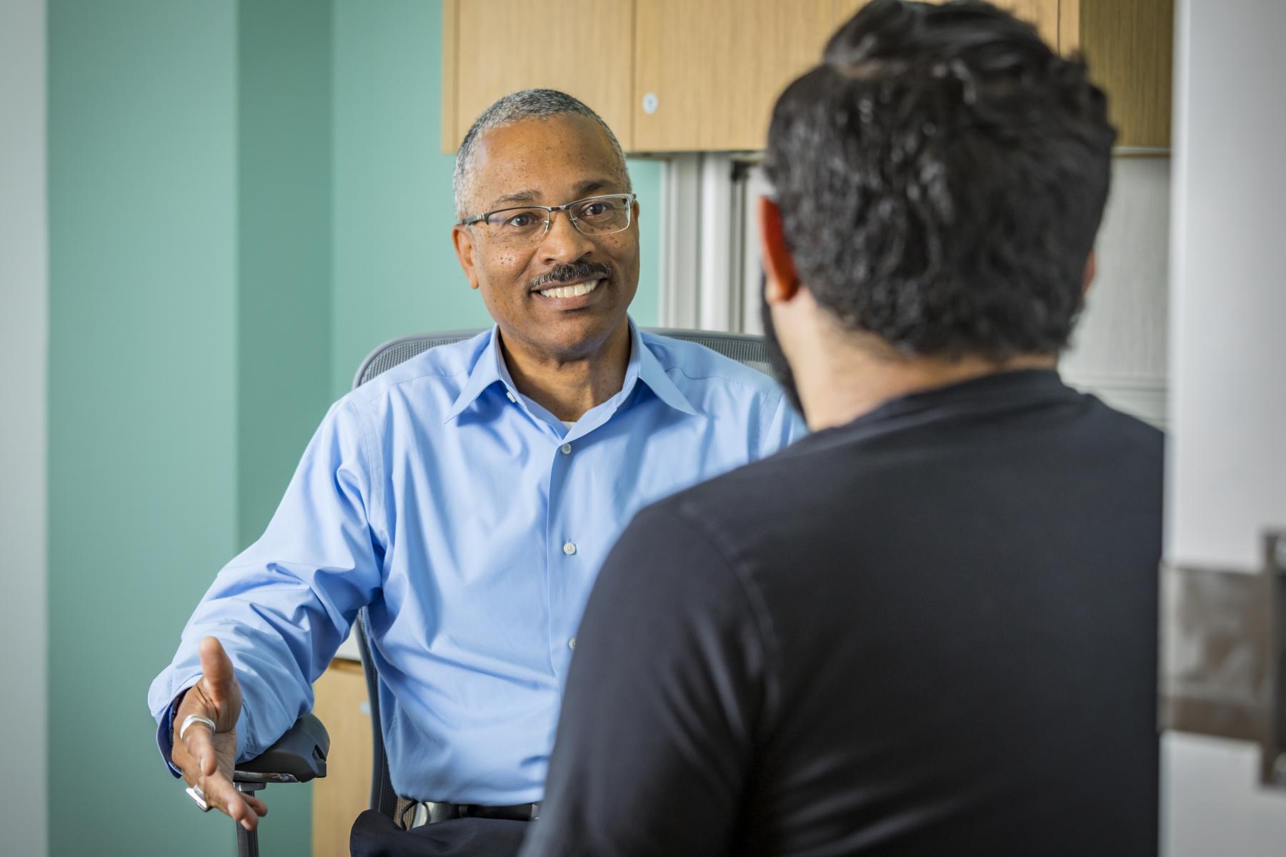 A counselor and student in a session