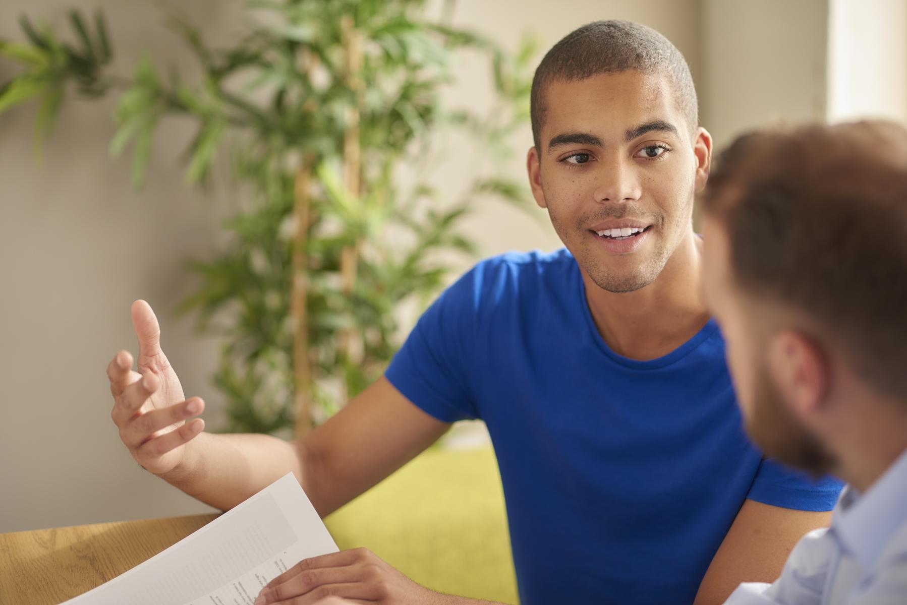 Student talking to a counselor