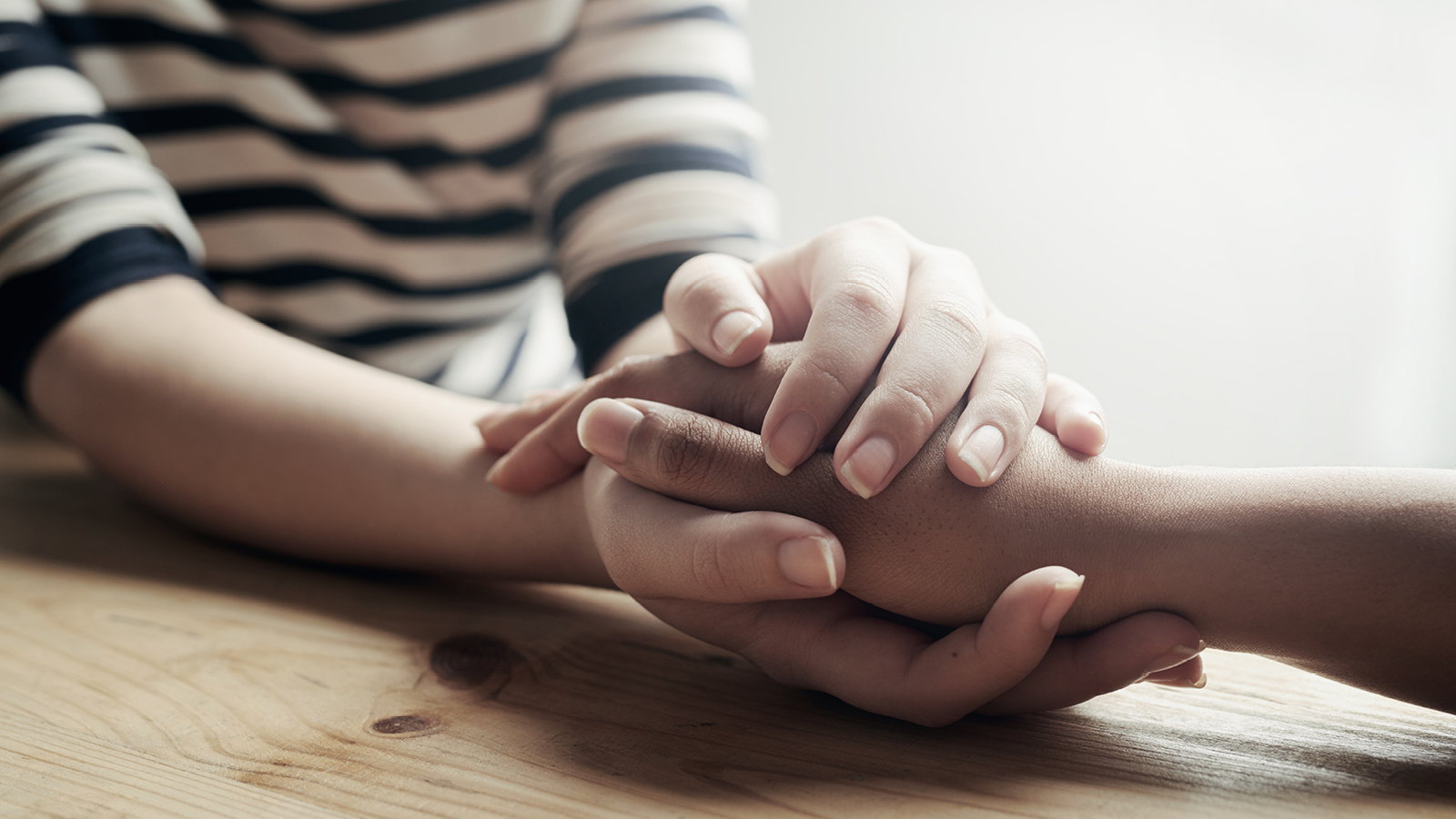 Couple holding hands